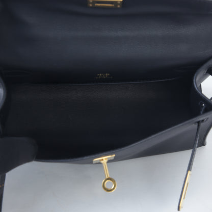 HERMÈS Hermès Kelly Pochette in Black with Gold Hardware 